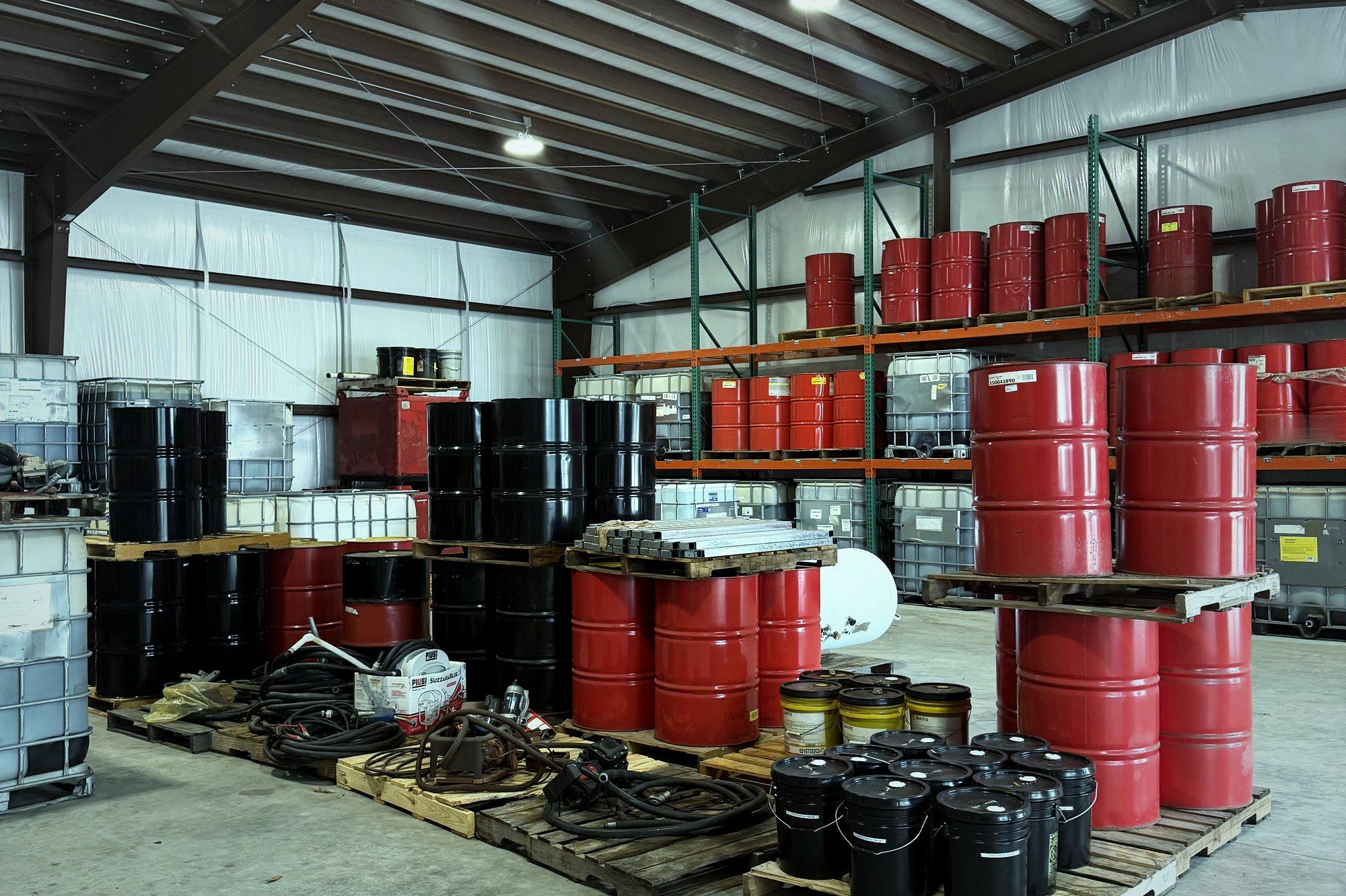 Lubricant drums stacked in the Donaldsonville warehouse